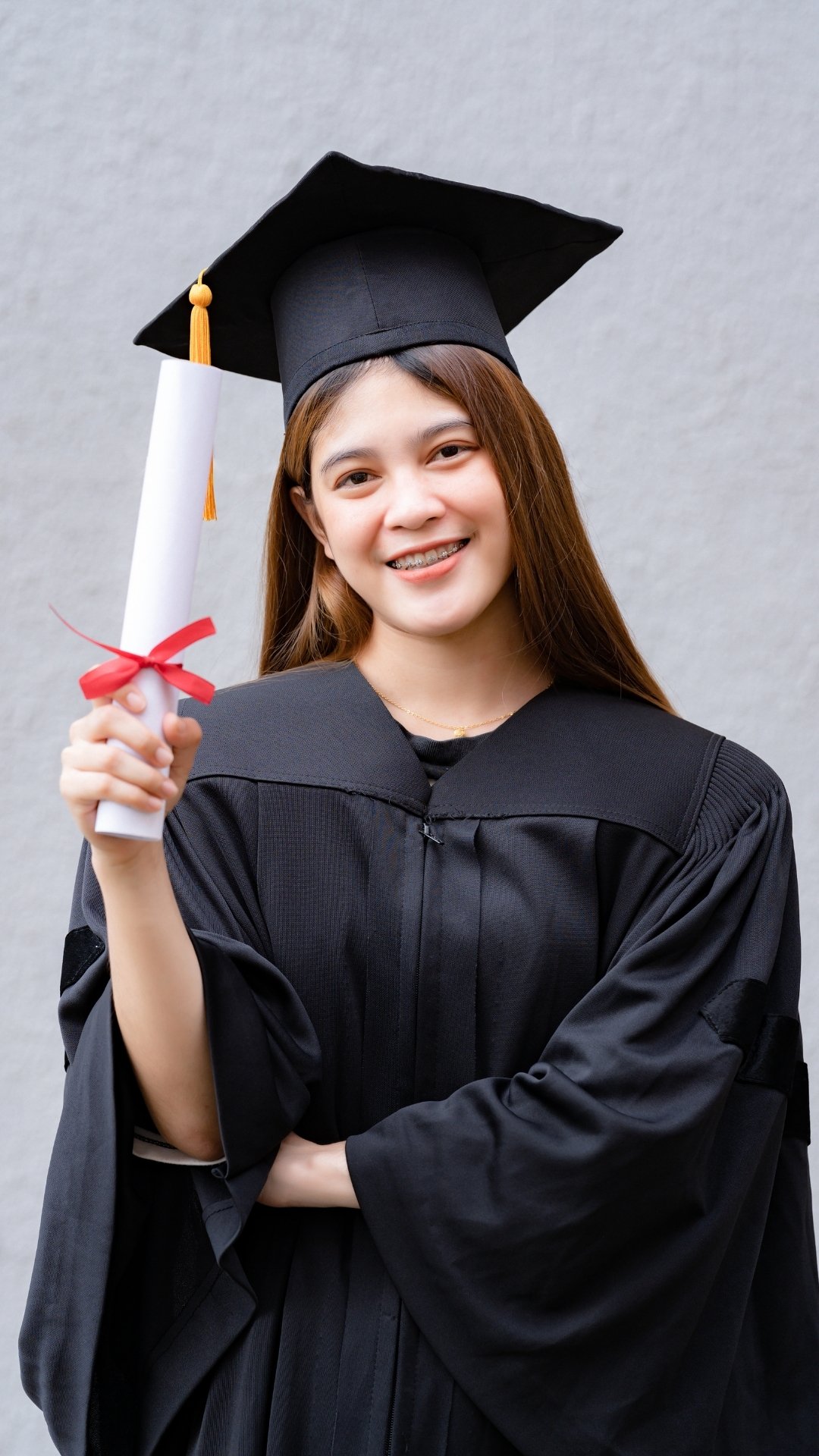 Happy students celebrating graduation after studying abroad